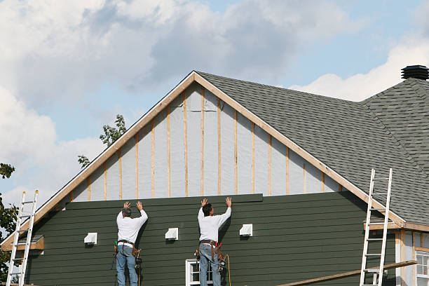 Professional Emergency Siding Repair technician working in Blaine, OH